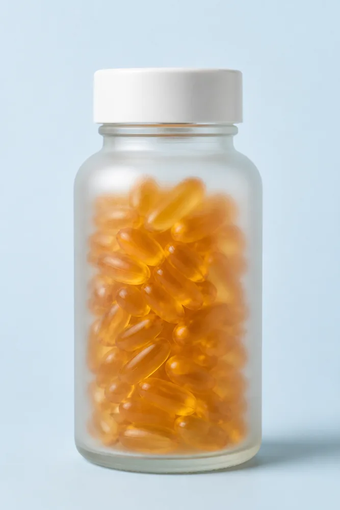 Frosted glass bottle with softgel capsules